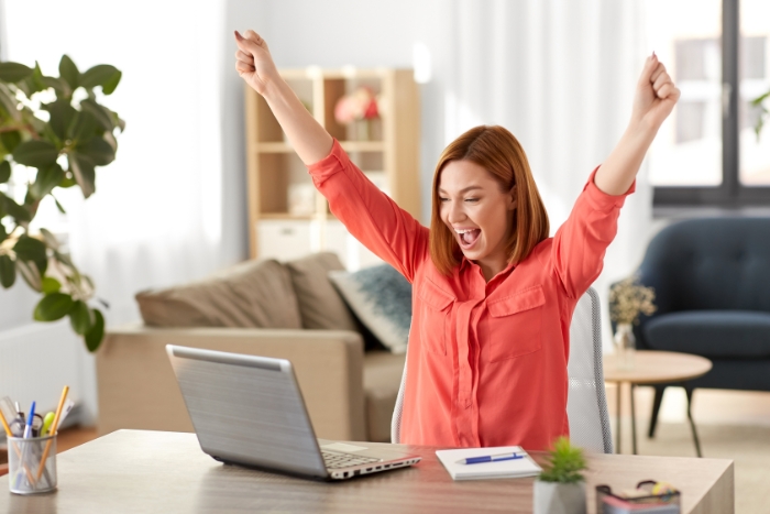 happy woman with laptop